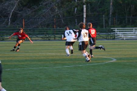 Alumintech battles Foresthills Safetychoice during the recent cup finals held at mainland fields.